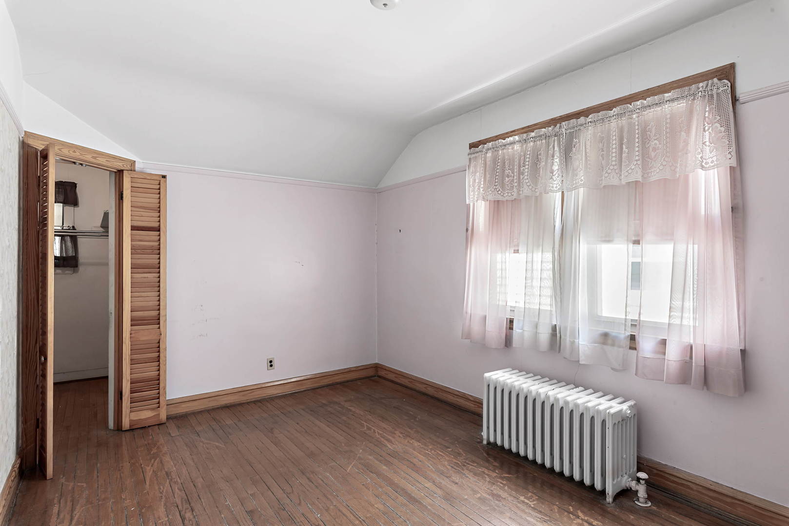 2425 North Mango Avenue Chicago, IL 60639 - Photo 12 of 17 an empty room with windows