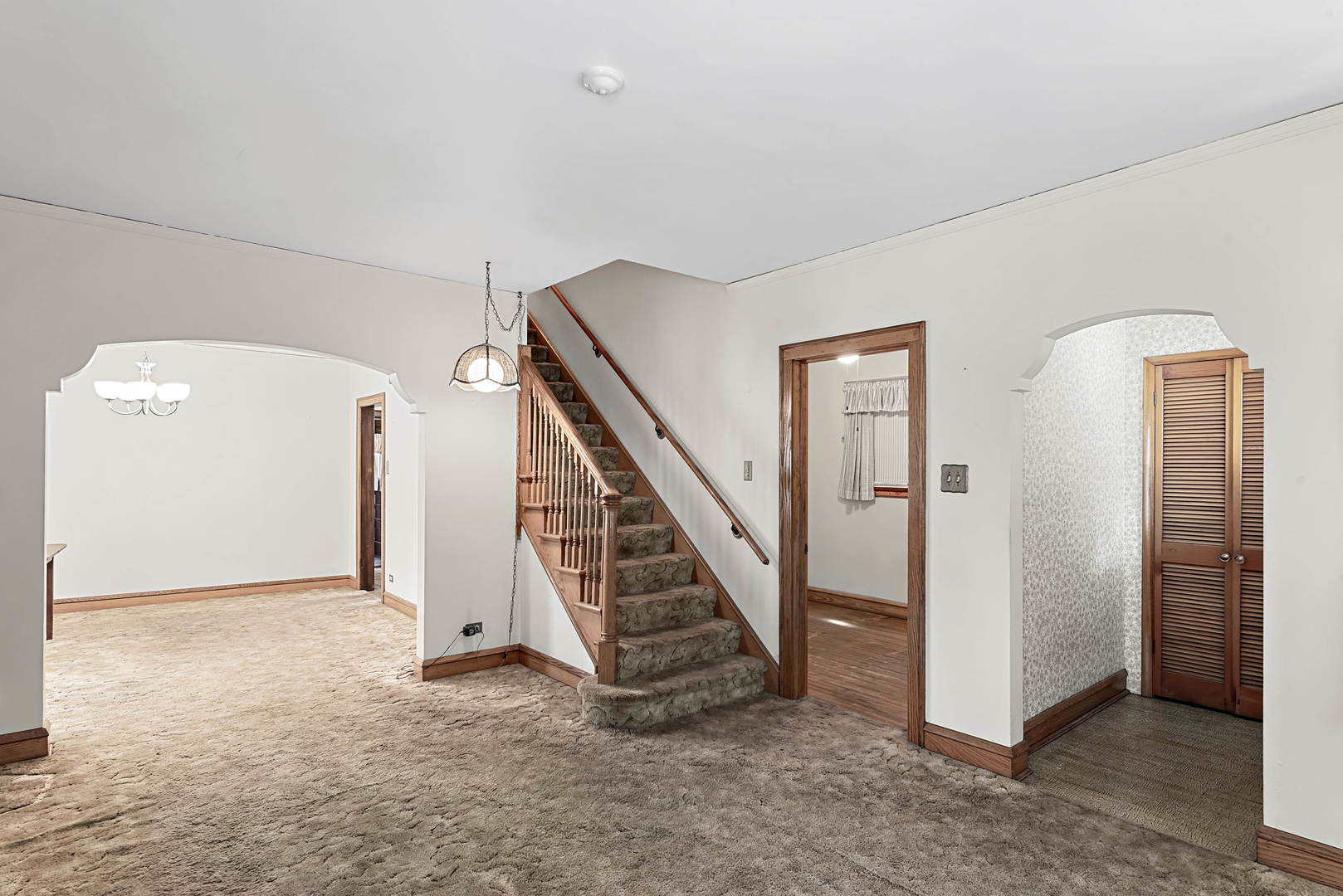 2425 North Mango Avenue Chicago, IL 60639 - Photo 3 of 17 a view of a hallway with staircase