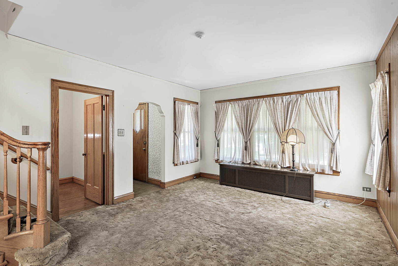 2425 North Mango Avenue Chicago, IL 60639 - Photo 4 of 17 an empty room with windows