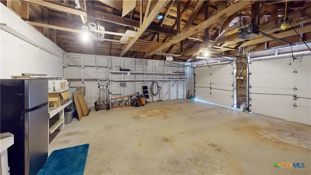 a view of a garage with furniture