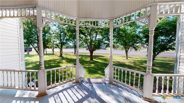 a view of a porch with garden