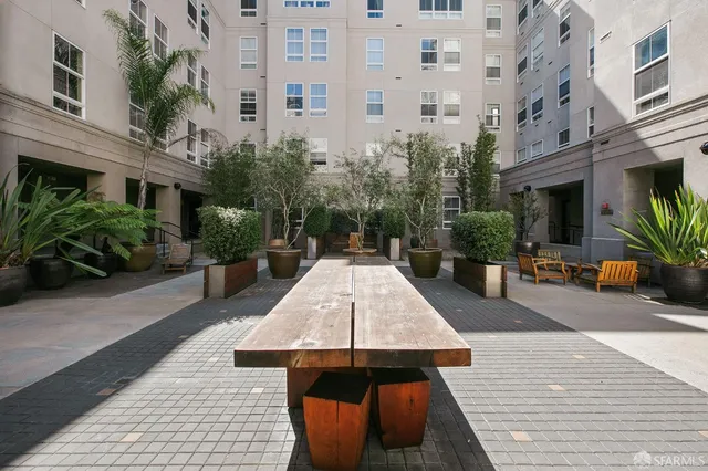 a backyard of a house with seating space