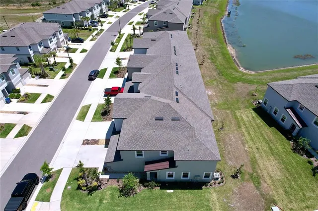 a view of a swimming pool with an outdoor space and seating area