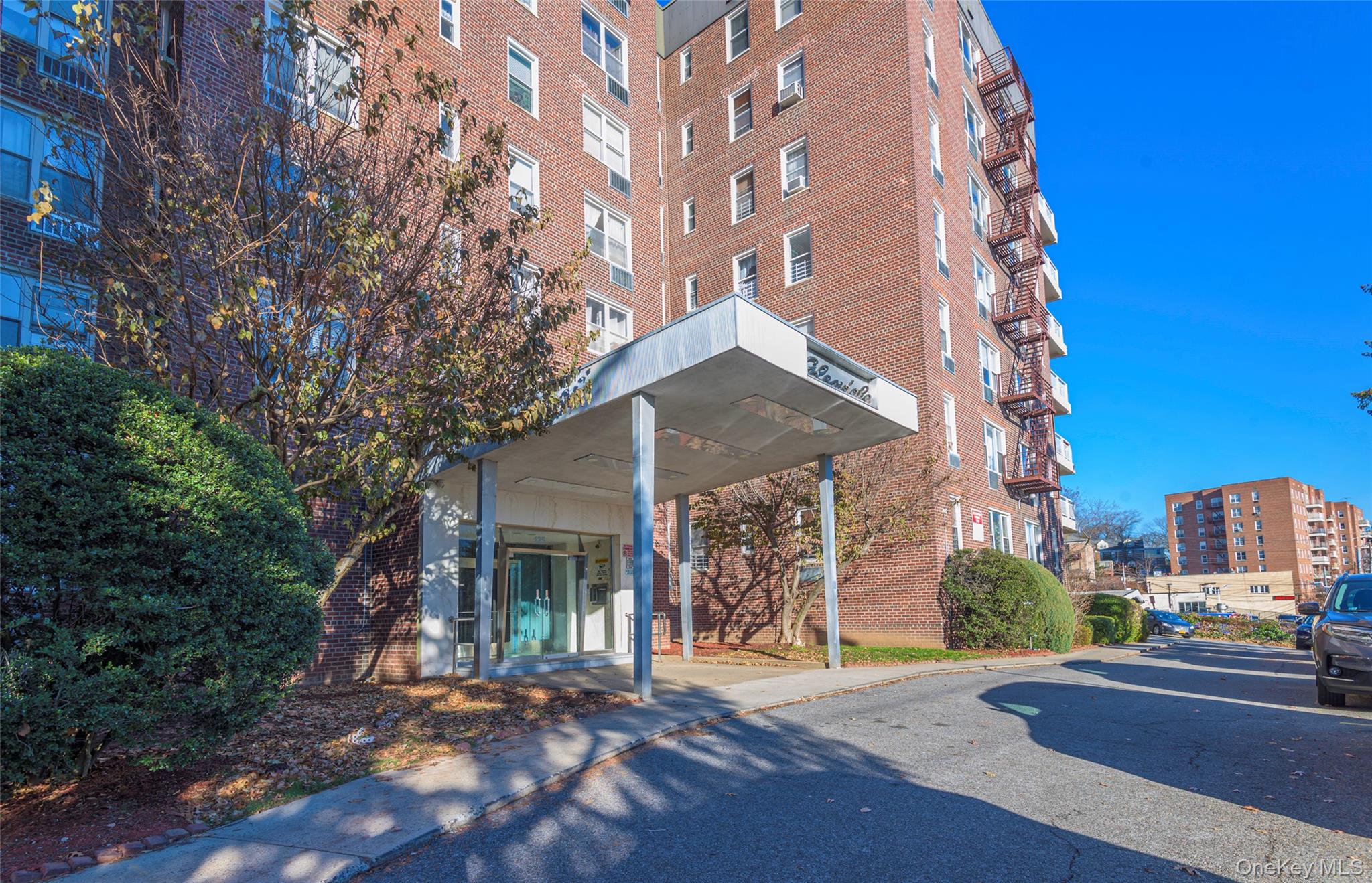 125 Bronx River Road, Unit 2E Yonkers, NY 10704 - Photo 29 of 31 a view of a building with a street