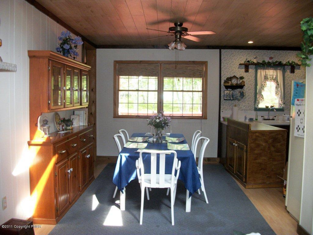 581 Wren Lane Bushkill, PA 18324 - Photo 3 of 16 a view of a dining room with furniture window and outside view