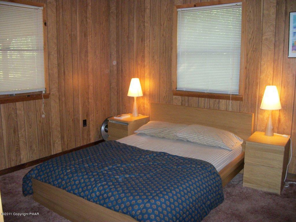 581 Wren Lane Bushkill, PA 18324 - Photo 10 of 16 a bedroom with a bed and window