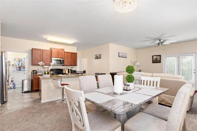 a view of a dining room with furniture