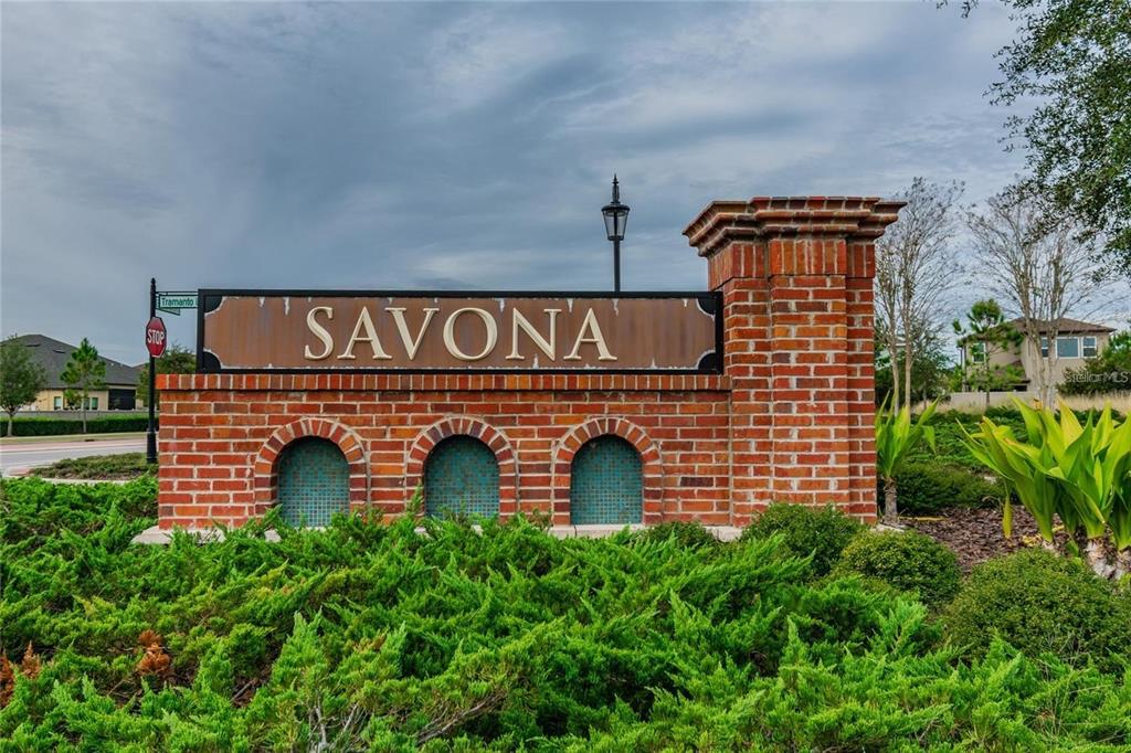 4738 Tramanto Lane Wesley Chapel, FL 33543 - Photo 5 of 45 a sign that is on the wall of building