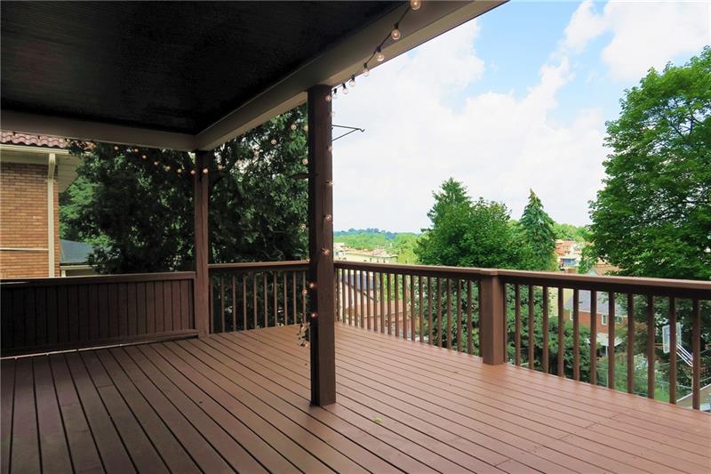 124 Ridgewood Avenue Pittsburgh, PA 15229 - Photo 18 of 21 HUGE, covered rear deck overlooks back yard.