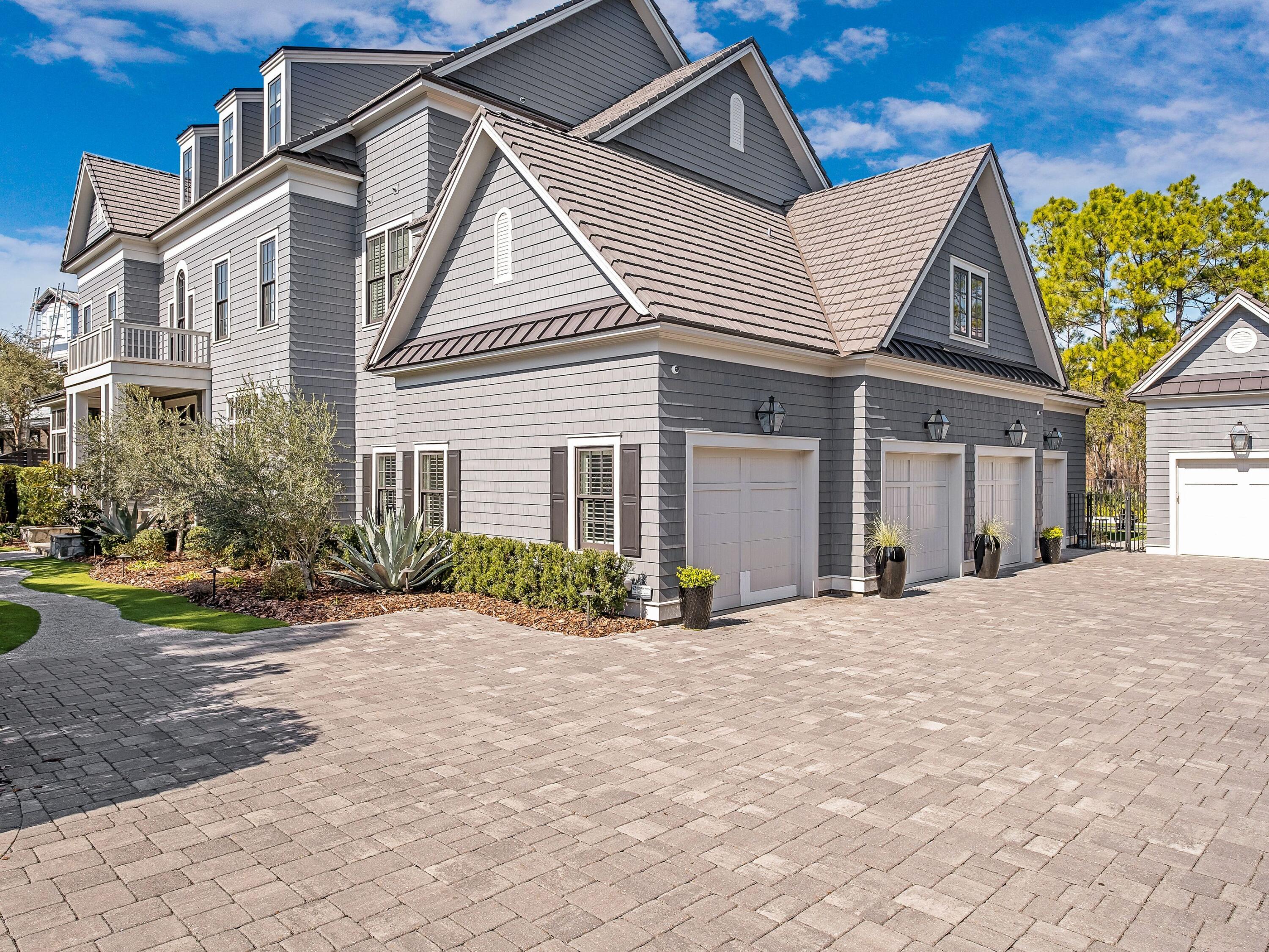 179 Brenda Ln Inlet Beach Inlet Beach, FL 32461 - Photo 60 of 63 a front view of a house with garden and plants