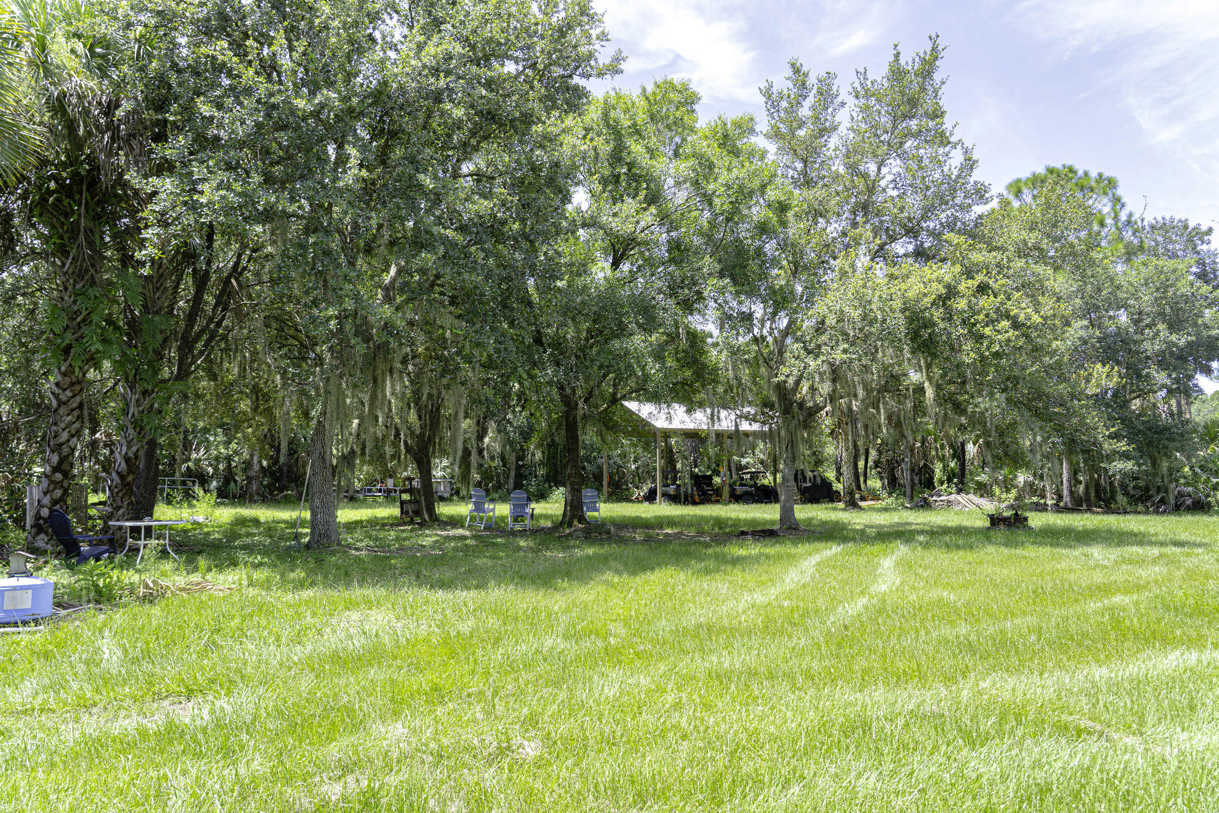 4902 Southwest Wild Turkey Lane Okeechobee, FL 34974 - Photo 10 of 17 a view of a park with large trees