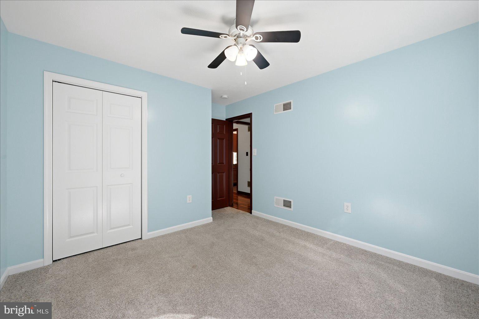 323 South Timber Ridge Road Cross Junction, VA 22625 - Photo 35 of 109 Serene blue room with cozy charm.