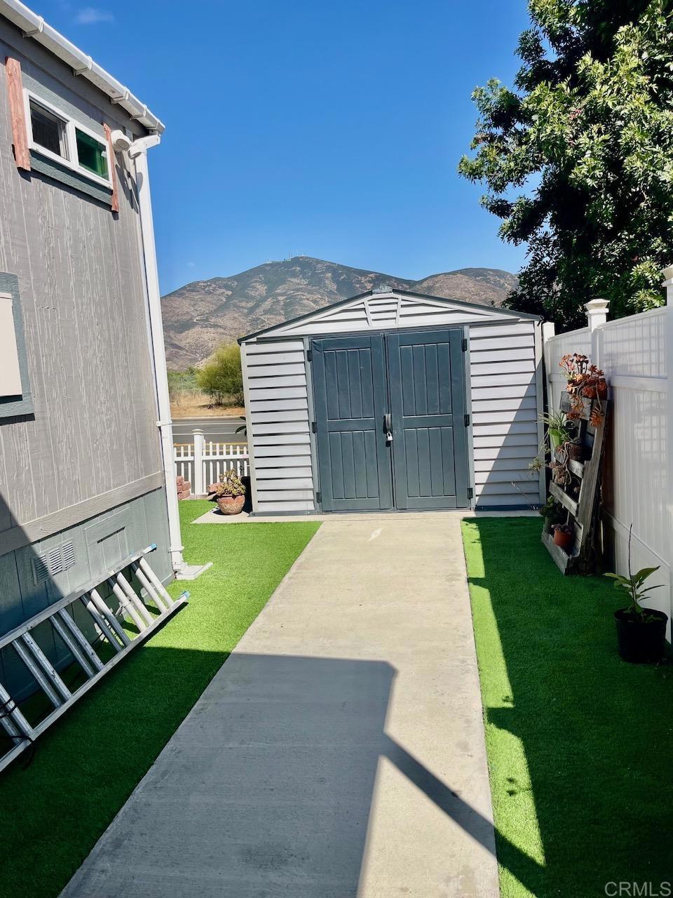 9902 Jamacha Boulevard, Unit 160 Spring Valley, CA 91977 - Photo 16 of 18 a view of a backyard of the house