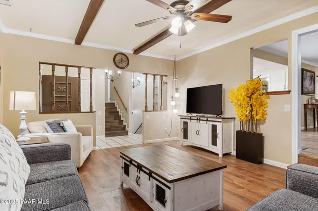a large kitchen with cabinets and stainless steel appliances