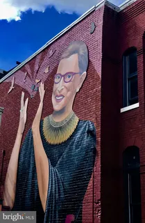 a view of a cafe with sitting area