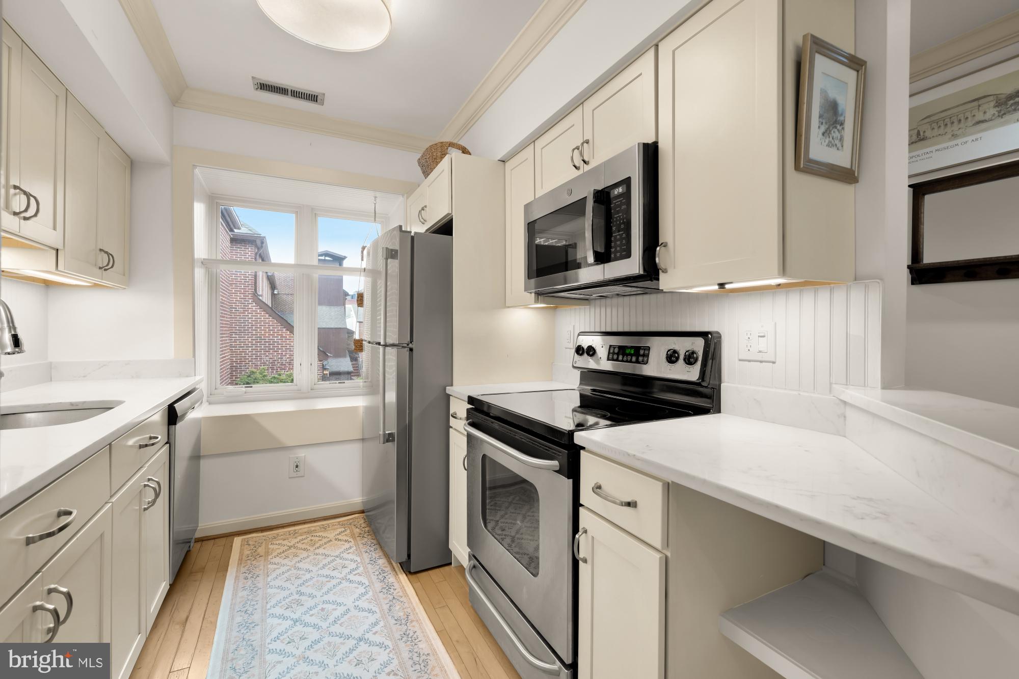 1715 15th Street Northwest, Unit 41 Washington, DC 20009 - Photo 7 of 32 Bright kitchen with large window