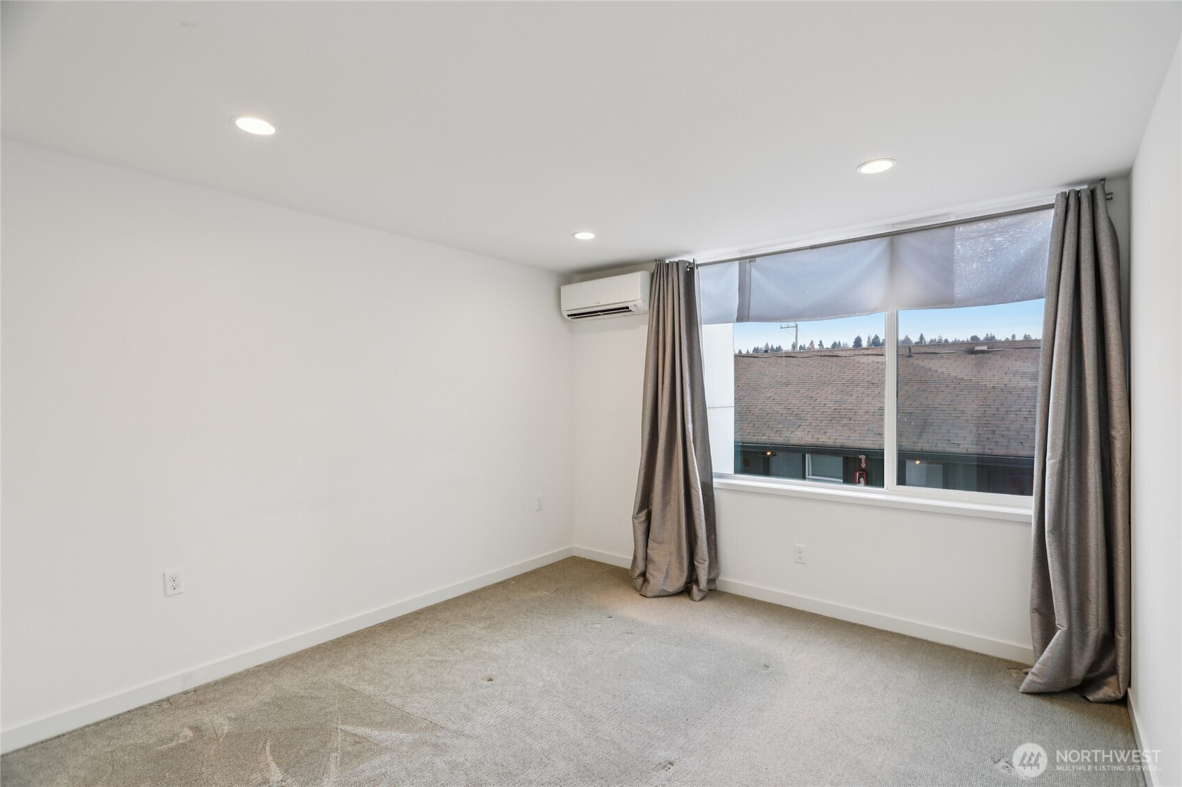 1117 Northwest 56th Street, Unit D Seattle, WA 98107 - Photo 14 of 32 a view of room with window