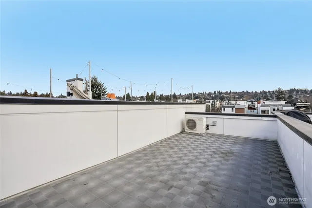 a kitchen with stainless steel appliances a sink and cabinets