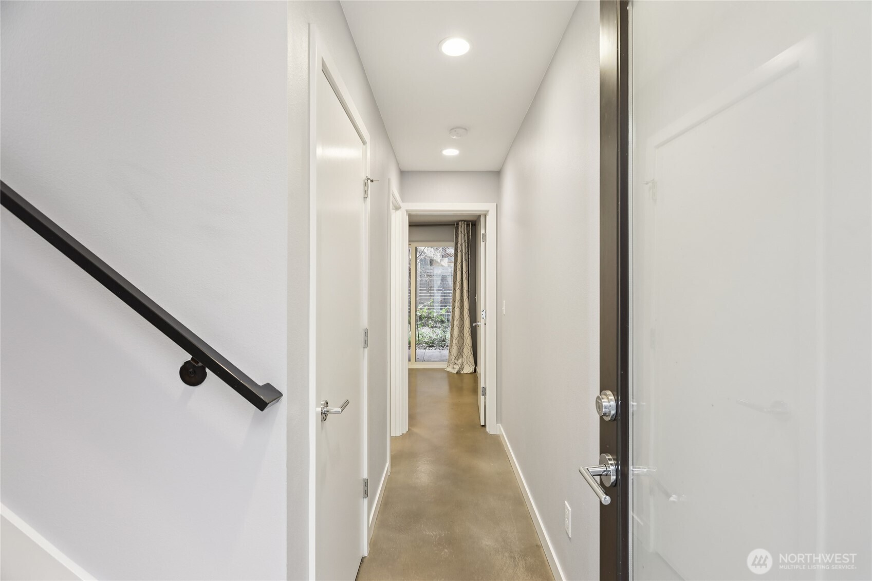 1117 Northwest 56th Street, Unit D Seattle, WA 98107 - Photo 4 of 32 a view of hallway with stairs