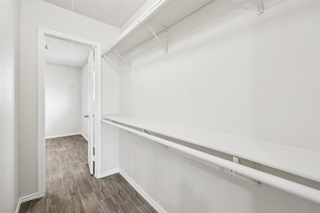 320 Edgewood Street Krum, TX 76249 - Photo 22 of 29 a view of an empty walk in closet