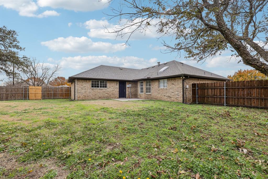 320 Edgewood Street Krum, TX 76249 - Photo 26 of 29 a house view with a garden space