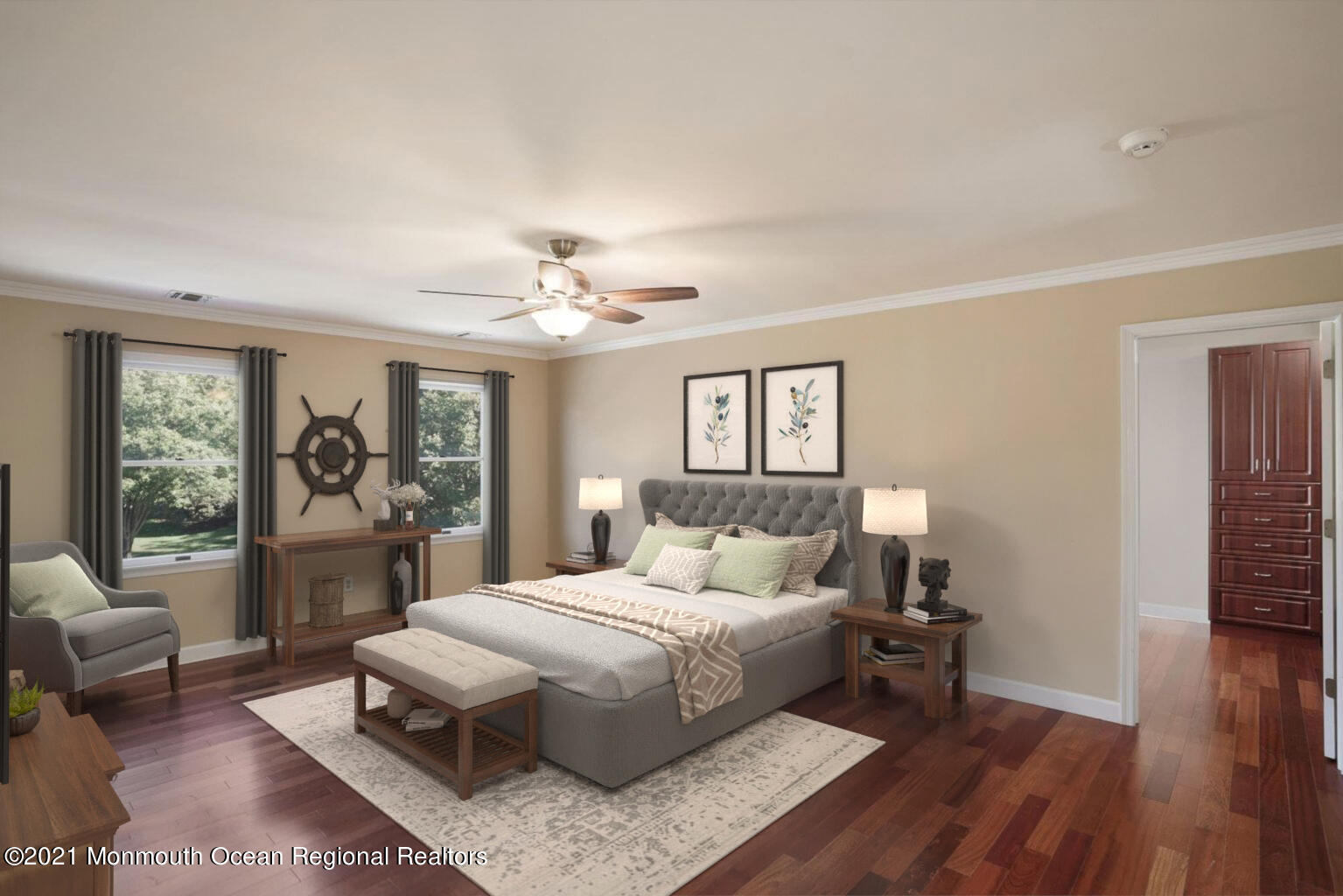 5 Roller Road Asbury Park, NJ 07712 - Photo 29 of 57 a bedroom with a large bed and a chandelier