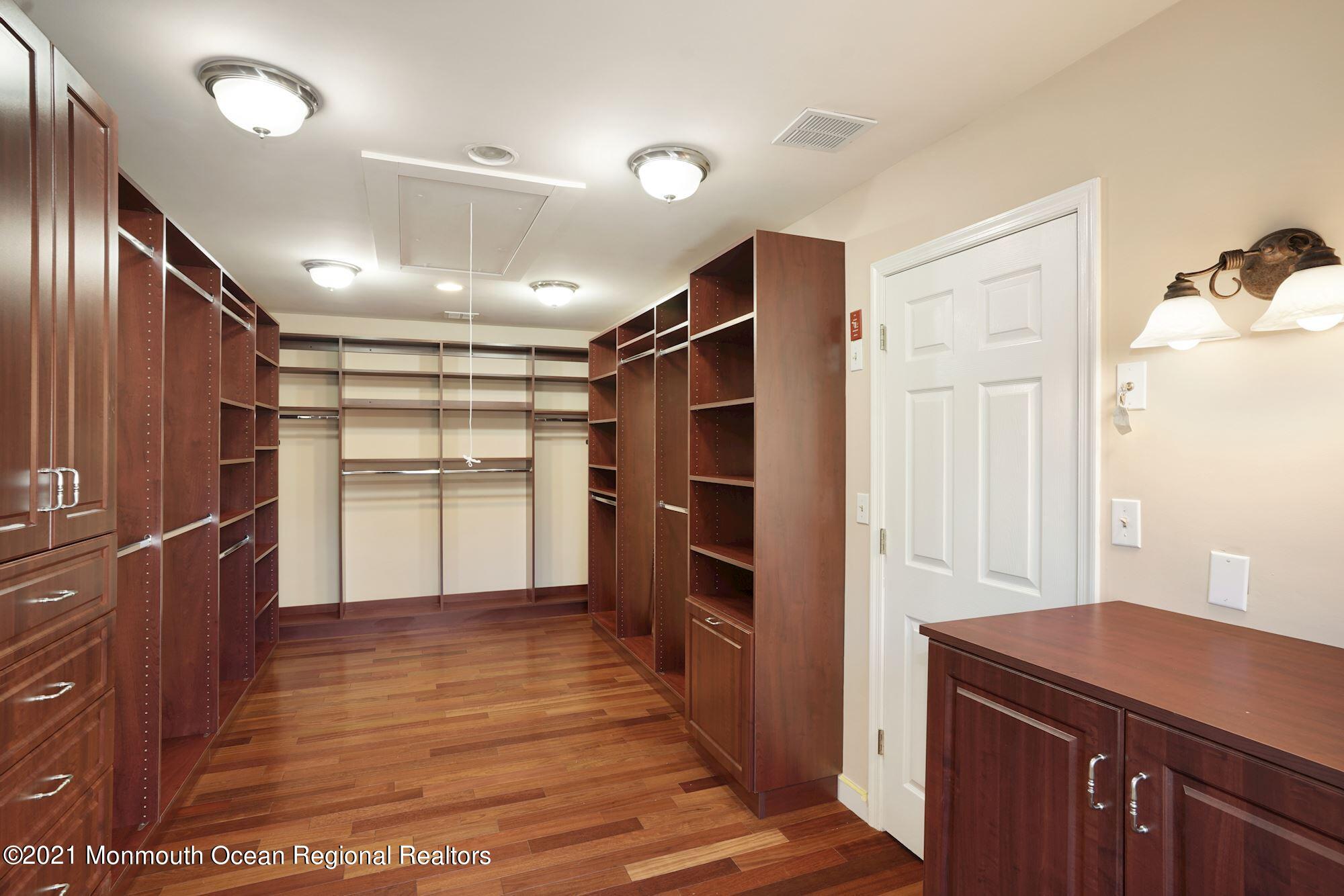 5 Roller Road Asbury Park, NJ 07712 - Photo 35 of 57 a view of a kitchen with a refrigerator and a stove