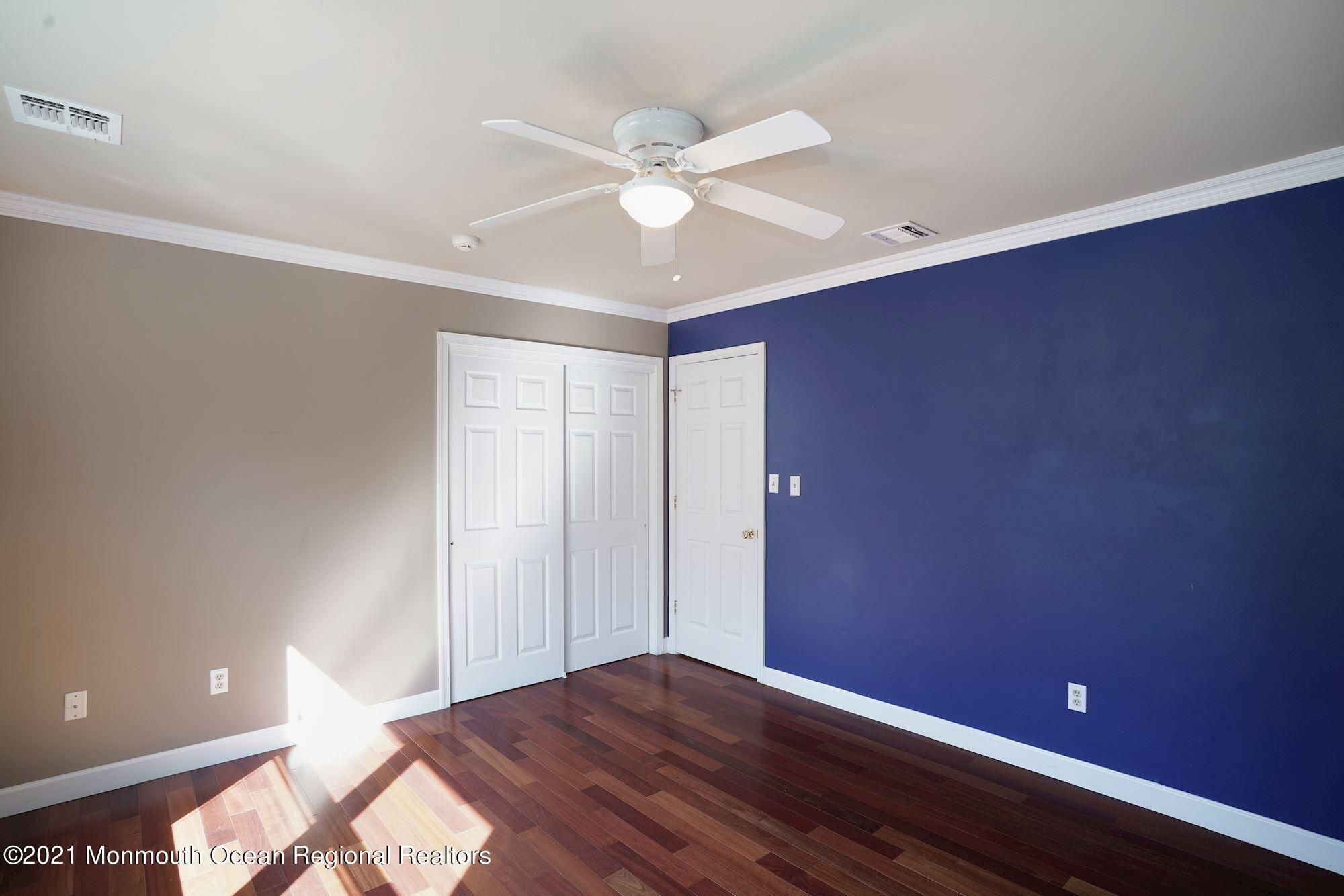 5 Roller Road Asbury Park, NJ 07712 - Photo 39 of 57 a view of room with window and ceiling fan
