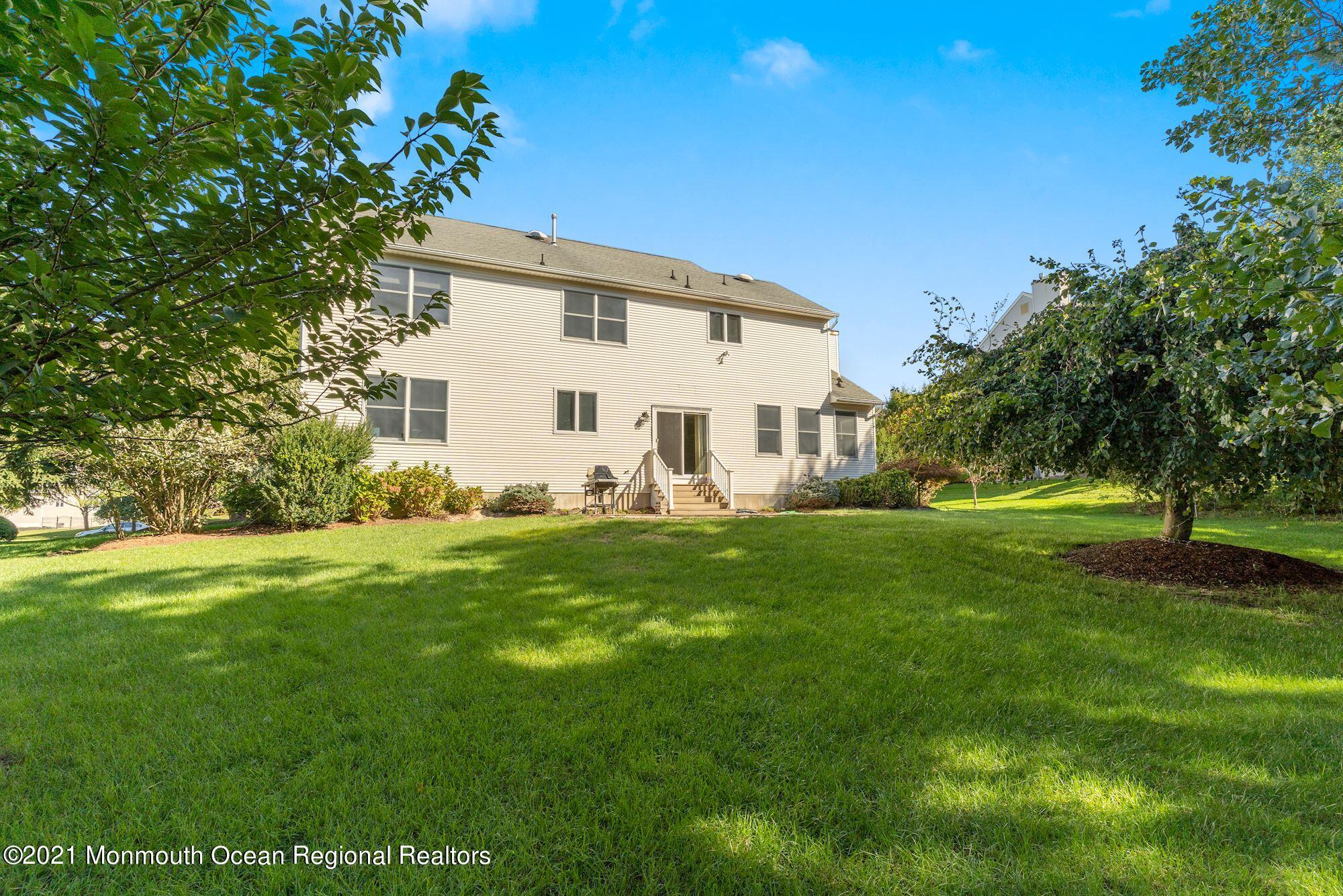5 Roller Road Asbury Park, NJ 07712 - Photo 56 of 57 a view of a house with a backyard