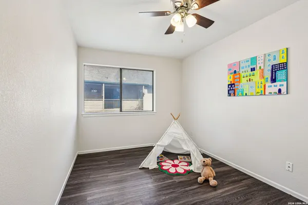 a room with toys and wooden floor