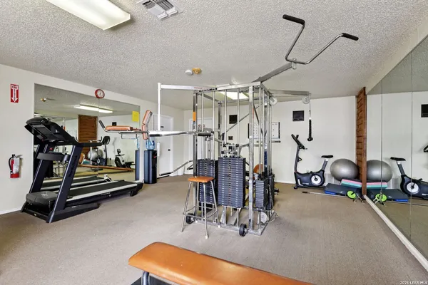 a view of a room with gym equipment