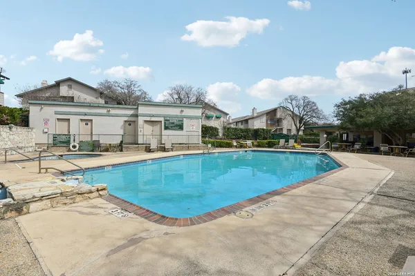 a view of a house with swimming pool