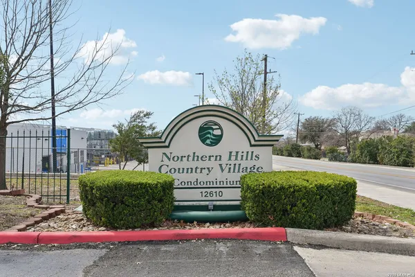a view of a street sign of the house