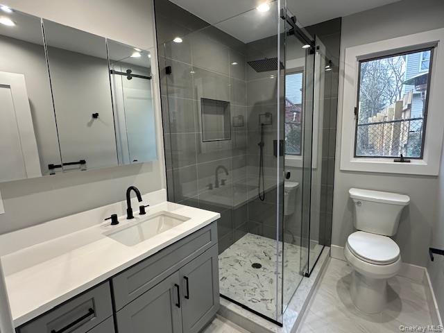 5 Linwood Road North, Unit 1 Port Washington, NY 11050 - Photo 7 of 12 Full bath featuring vanity and a shower stall