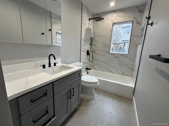 5 Linwood Road North, Unit 1 Port Washington, NY 11050 - Photo 9 of 12 Bathroom featuring vanity and a combined bath / shower with marble appearance