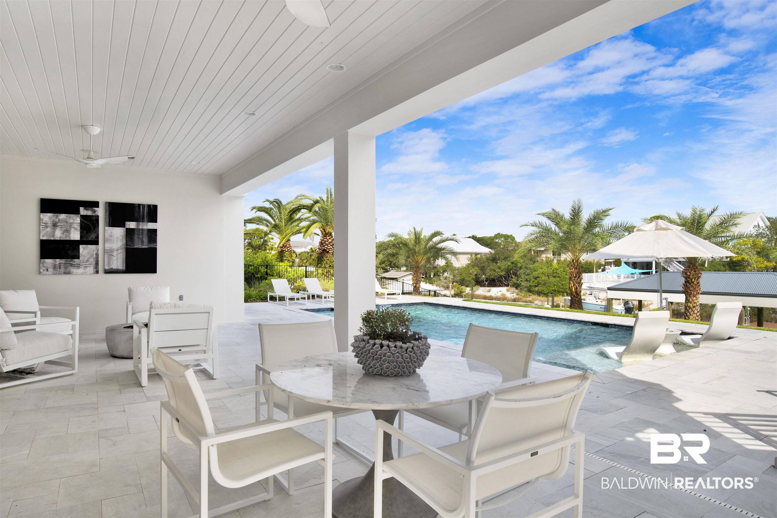 30239 Canal Court Orange Beach, AL 36561 - Photo 60 of 70 View of patio with a ceiling fan and an outdoor pool
