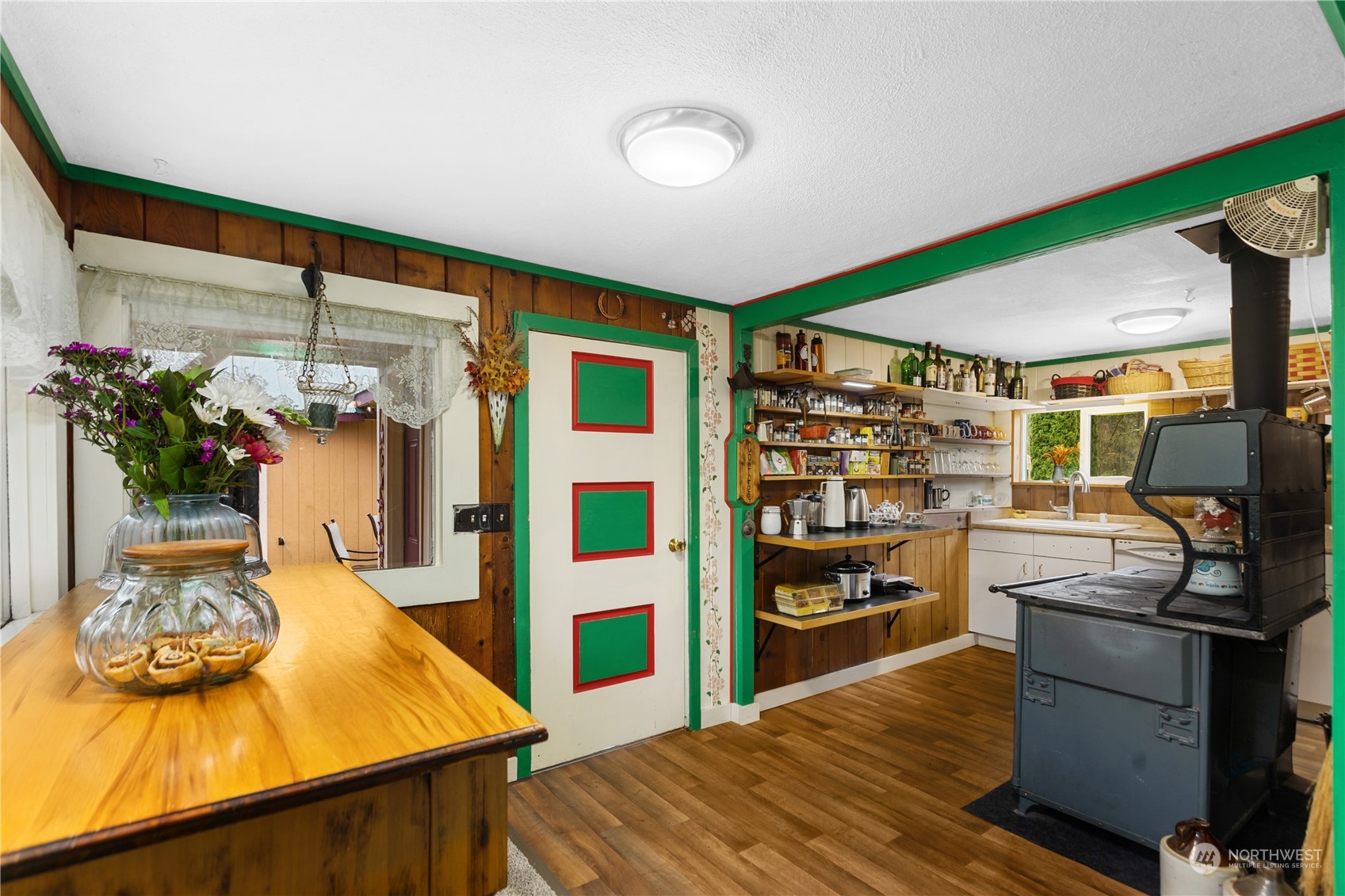 36922 Swede Heaven Road Arlington, WA 98223 - Photo 15 of 40 a kitchen with a table and chairs