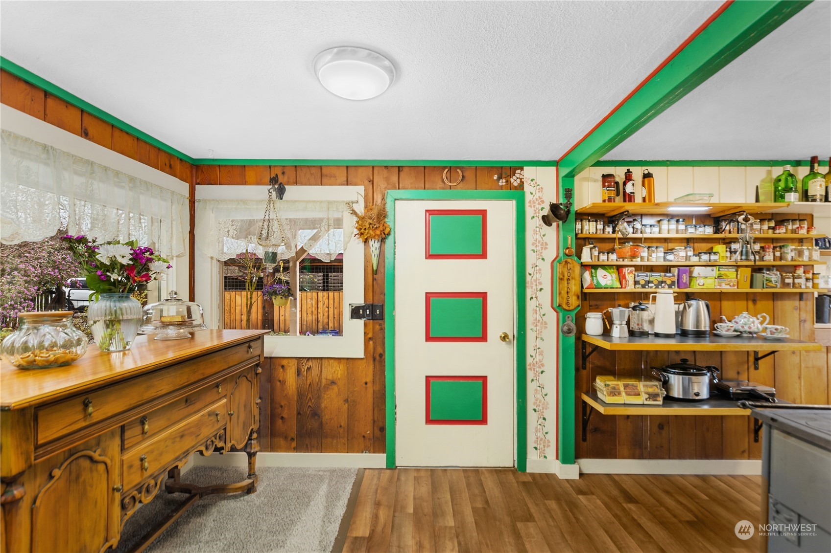 36922 Swede Heaven Road Arlington, WA 98223 - Photo 16 of 40 a kitchen with stainless steel appliances granite countertop a stove and a wooden floor
