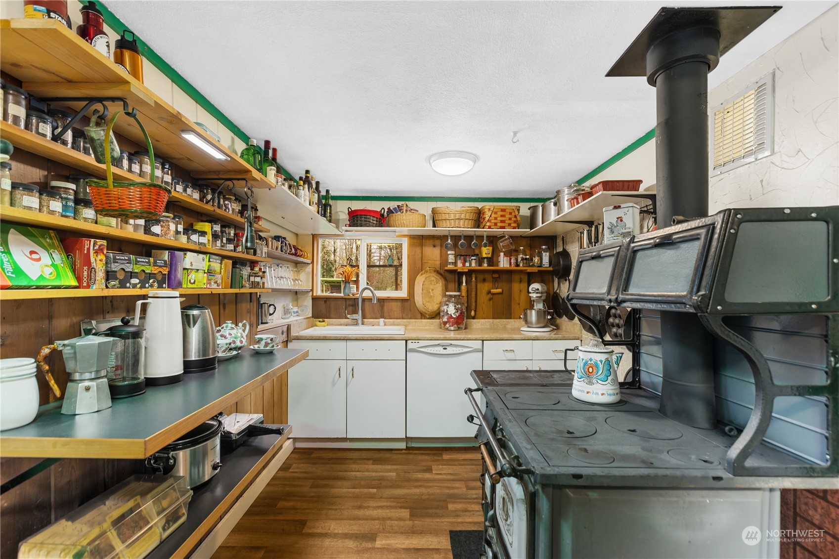 36922 Swede Heaven Road Arlington, WA 98223 - Photo 17 of 40 a kitchen with stainless steel appliances granite countertop a sink and a stove
