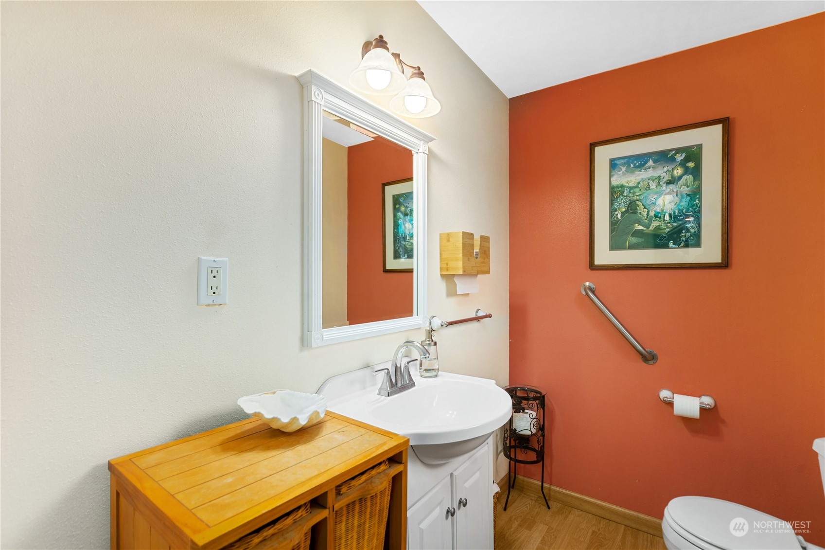36922 Swede Heaven Road Arlington, WA 98223 - Photo 24 of 40 a bathroom with a sink a toilet and mirror