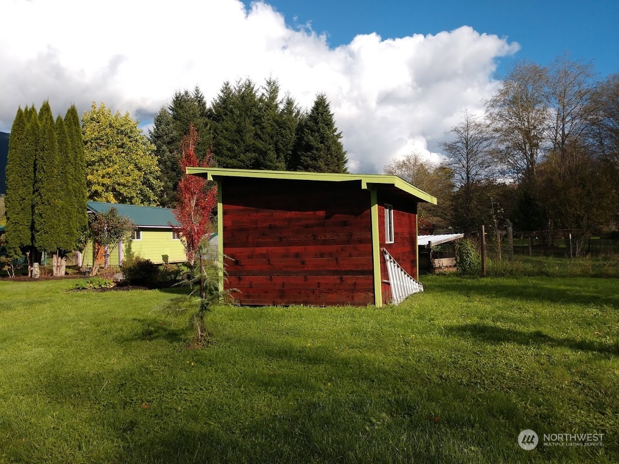 36922 Swede Heaven Road Arlington, WA 98223 - Photo 30 of 40 a view of a back yard of the house with green space