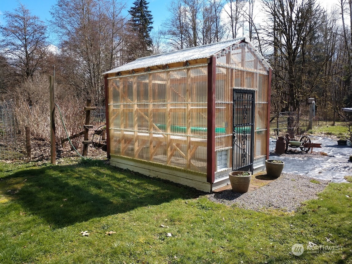 36922 Swede Heaven Road Arlington, WA 98223 - Photo 31 of 40 a view of a garden with large trees