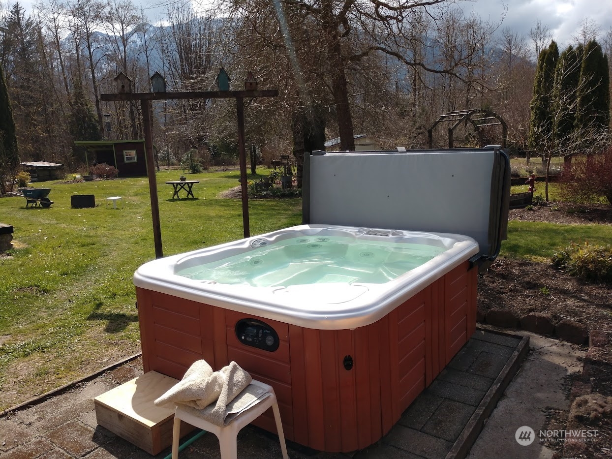 36922 Swede Heaven Road Arlington, WA 98223 - Photo 35 of 40 a view of a backyard with sitting area