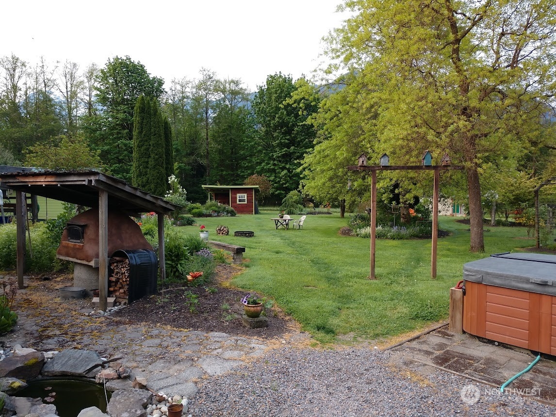 36922 Swede Heaven Road Arlington, WA 98223 - Photo 36 of 40 a view of a chair and fire pit in the park