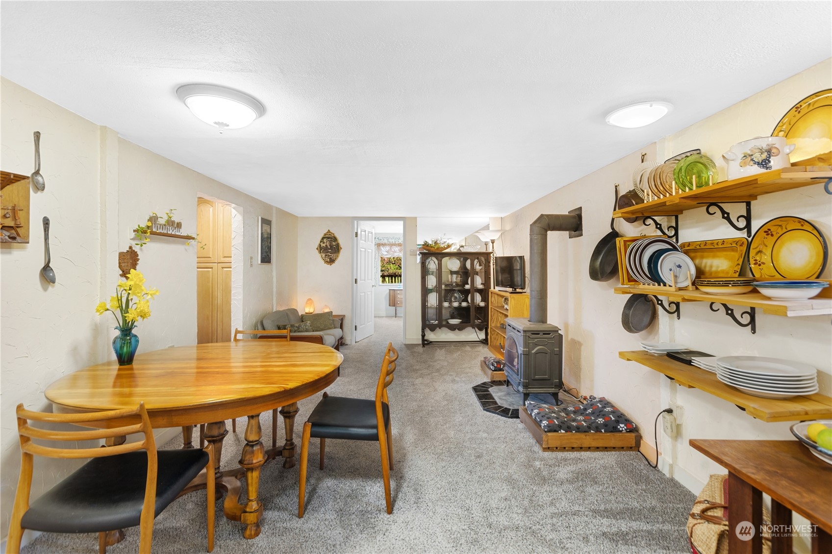 36922 Swede Heaven Road Arlington, WA 98223 - Photo 10 of 40 a view of a dining room with furniture and wooden floor