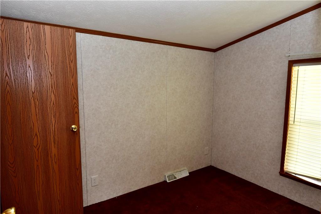604 Deana Way Rochester, PA 15074 - Photo 12 of 22 a small space with a window and a wooden floor