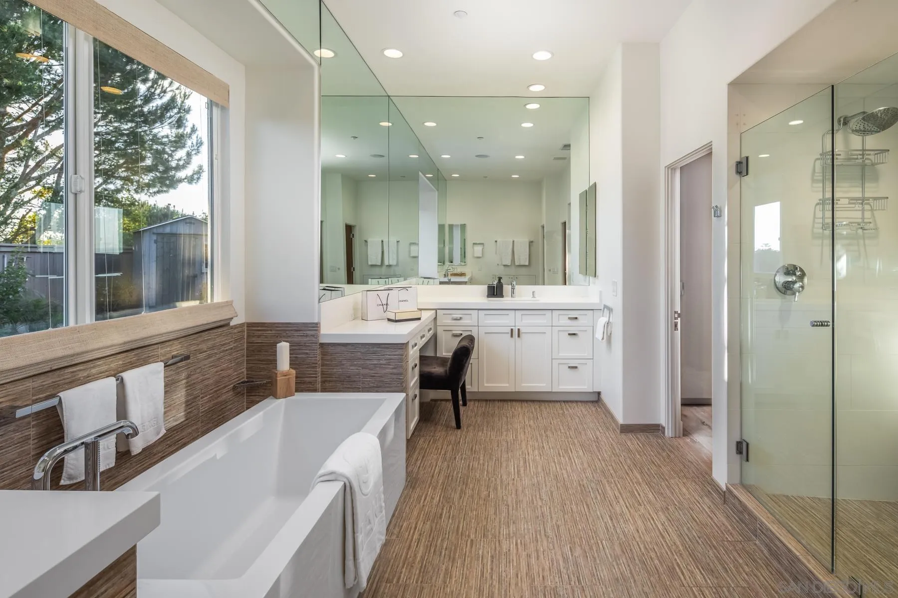 1355 Ravean Court Encinitas, CA 92024 - Photo 13 of 31 a large bathroom with a large tub and sink