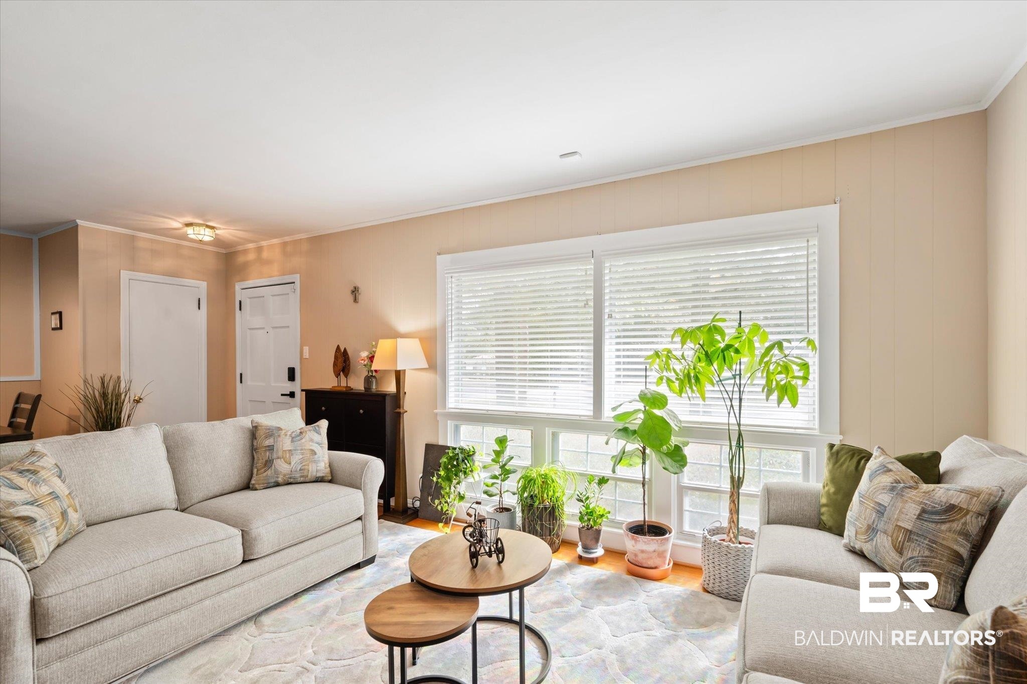 162 Bit And Spur Terrace Mobile, AL 36608 - Photo 2 of 29 Living room with ornamental molding and light wood-type flooring