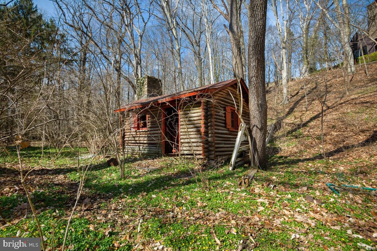 1209 Rydal Road Jenkintown, PA 19046 - Photo 34 of 37 A log cabin located in your woods
