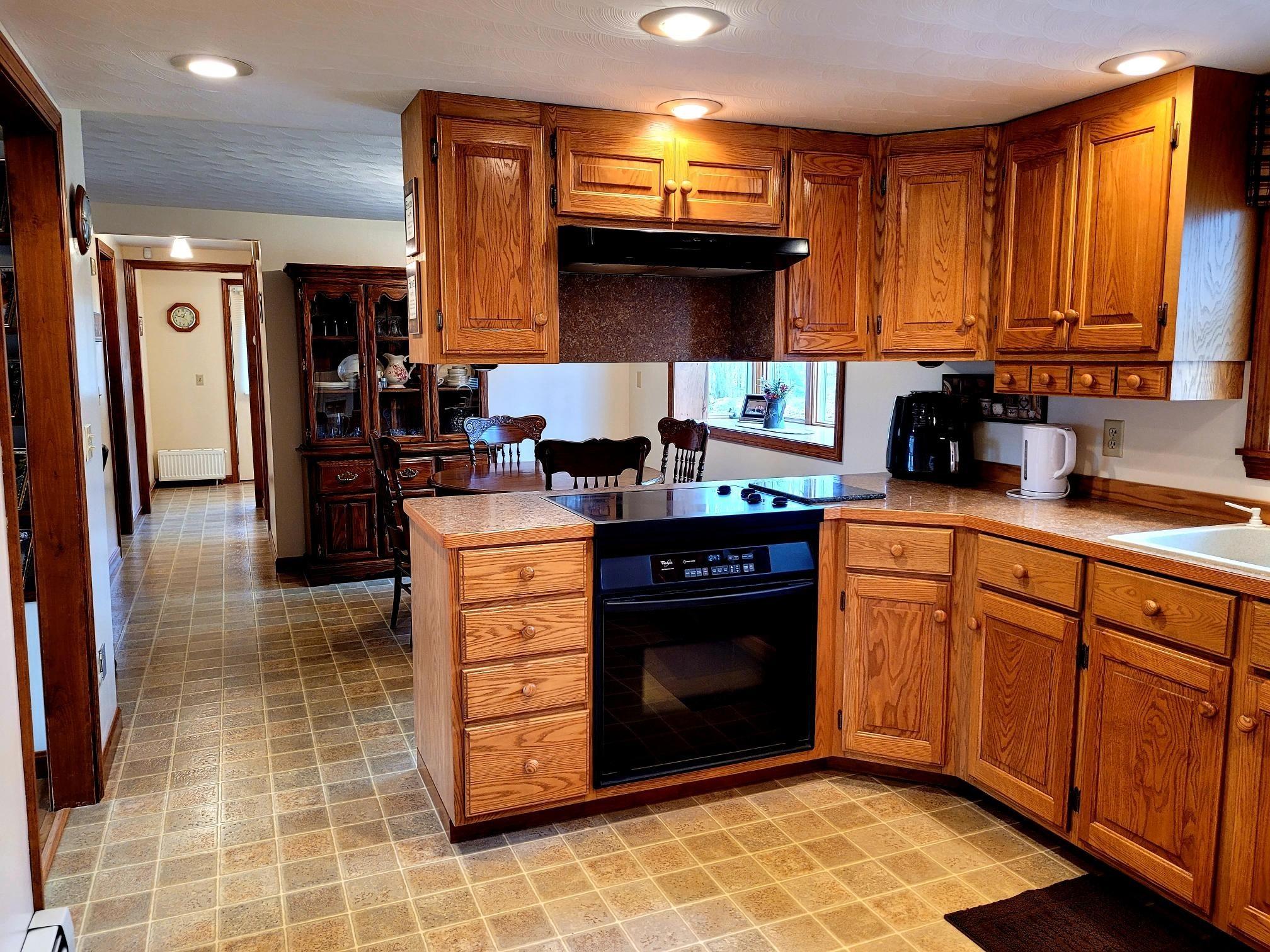128 Ward Hill Road Norridgewock, ME 04957 - Photo 9 of 45 Kitchen looking into dining area